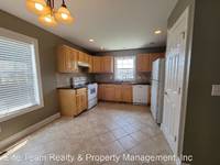 $1,875 / Month Home For Rent: Riverwalk Dr NW 415 - Elite Team Realty & P...