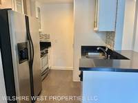 $2,995 / Month Apartment For Rent: 649 S Ridgeley Dr. - 107 - WILSHIRE WEST PROPER...